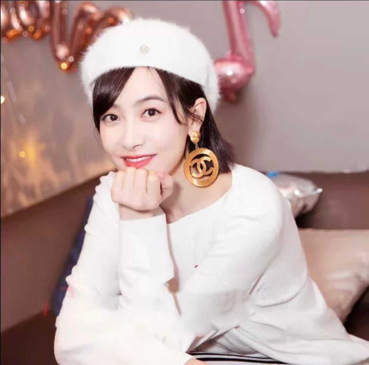 Chanel oversized gold logo ear clip runway style
