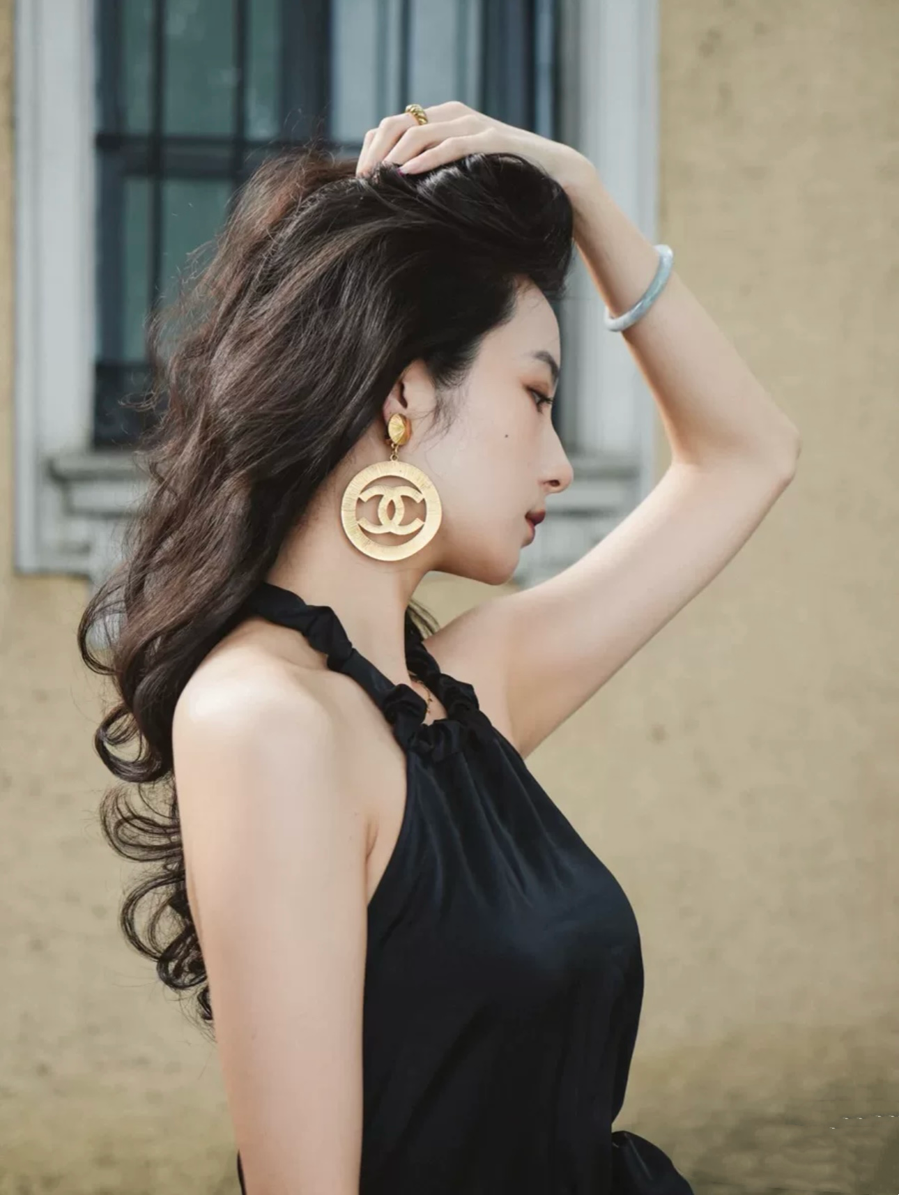 Chanel oversized gold logo ear clip runway style