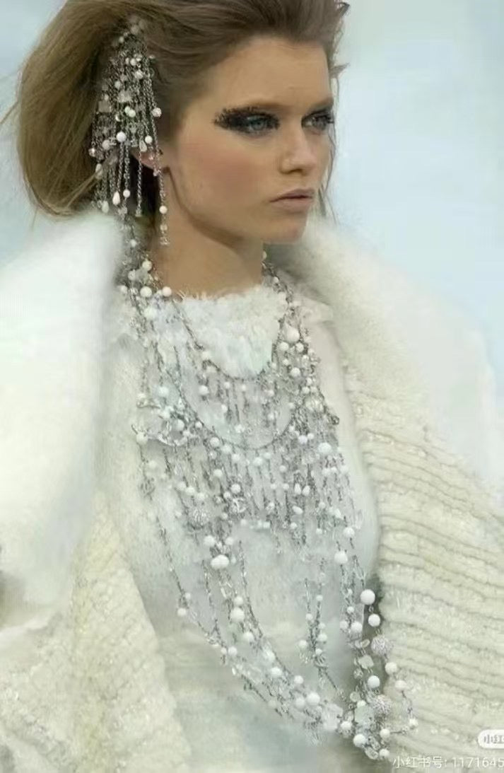 Chanel Ice Flow Su Da Logo Brooch