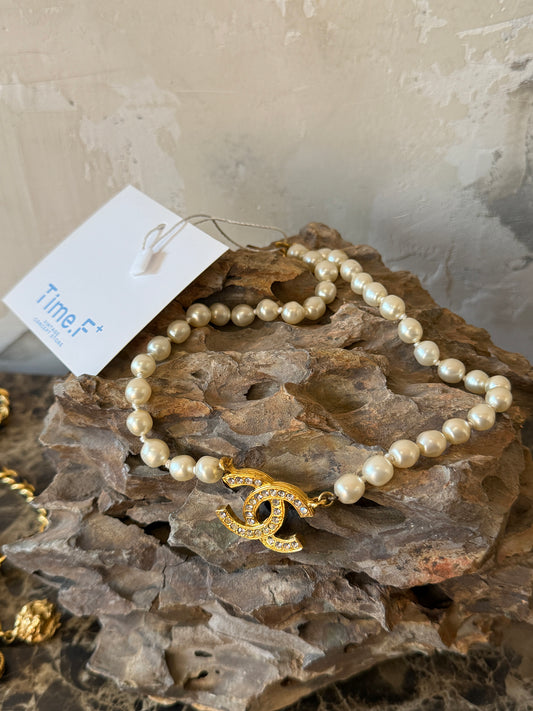 Chanel classic vintage pearl choker with rhinestone inlaid logo