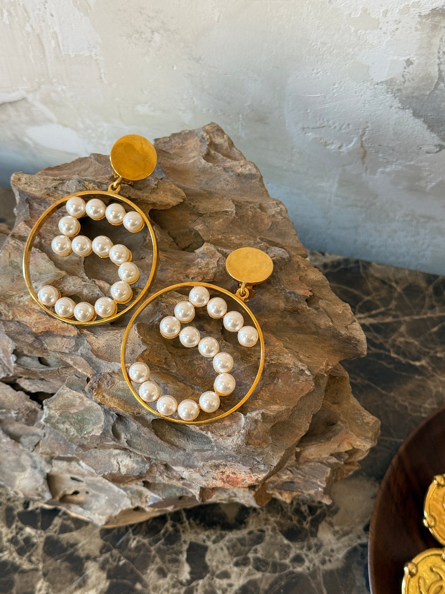 Chanel exaggerated pearl No.5 earrings from the 1980s