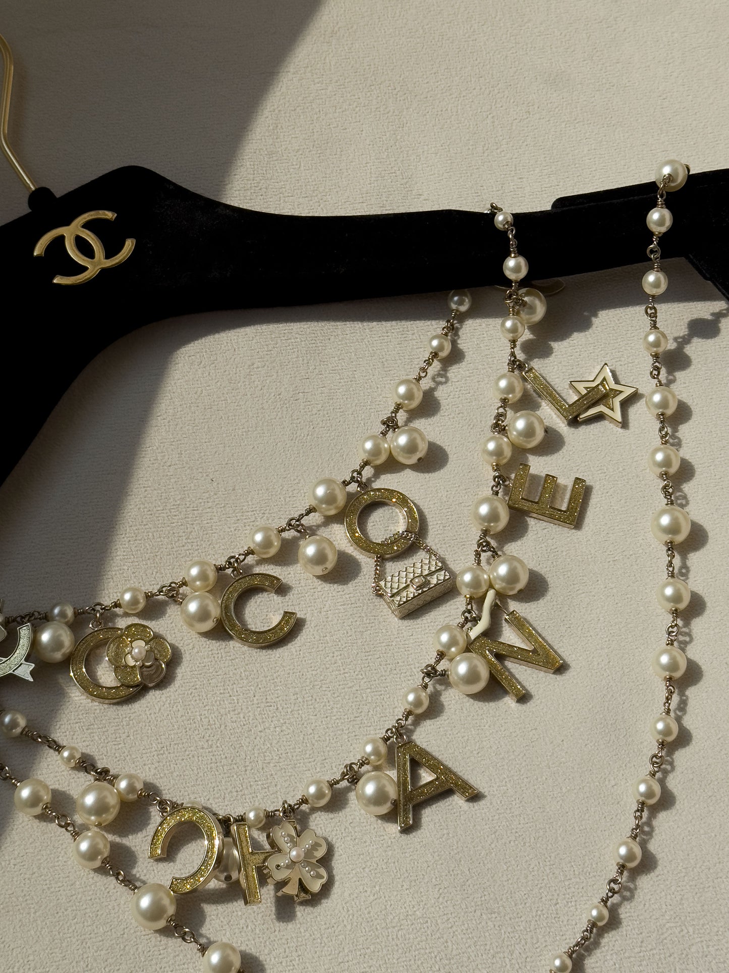Chanel Christmas limited edition pearl letter enamel waist chain