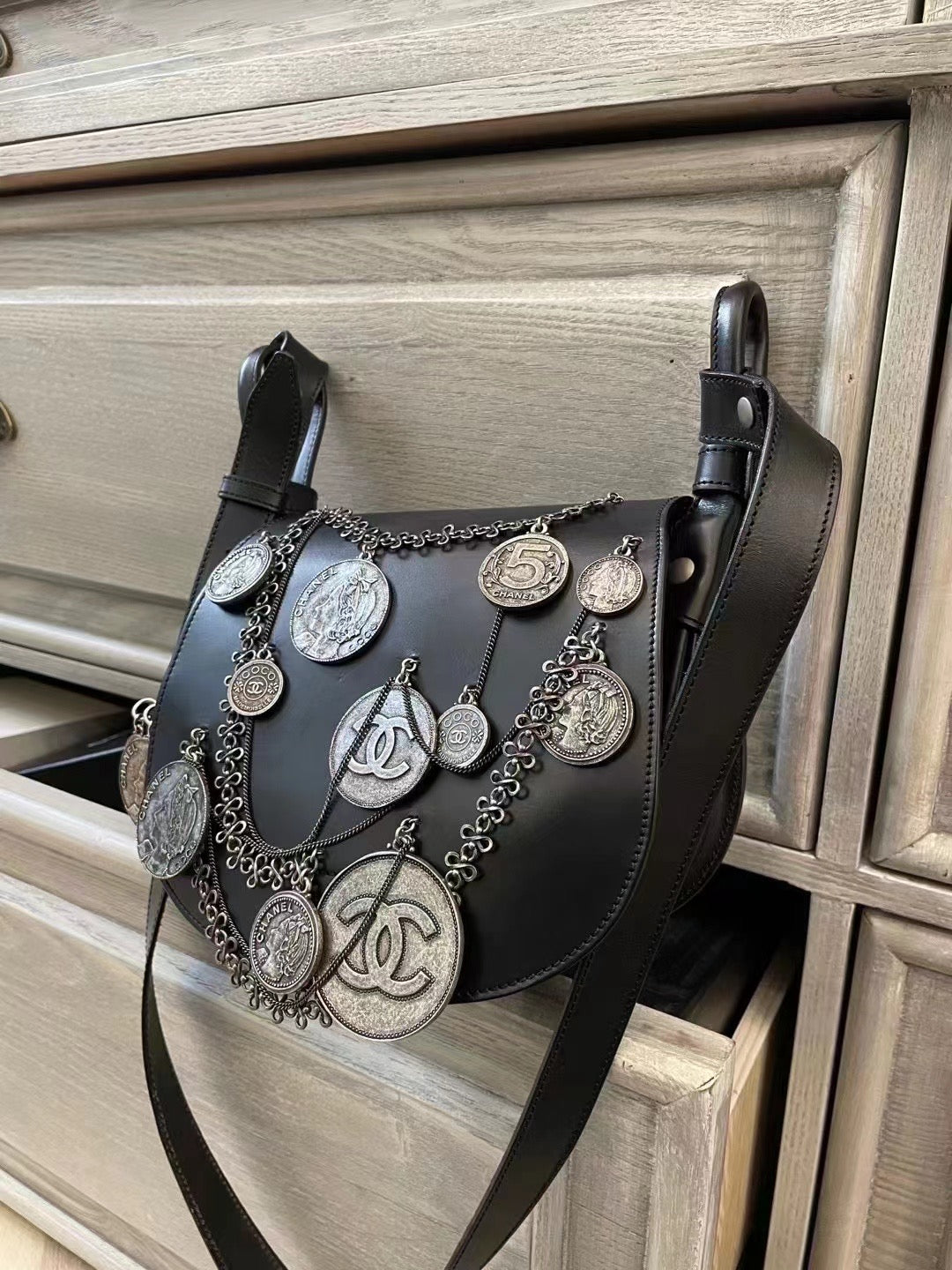 Chanel portrait coin saddle bag