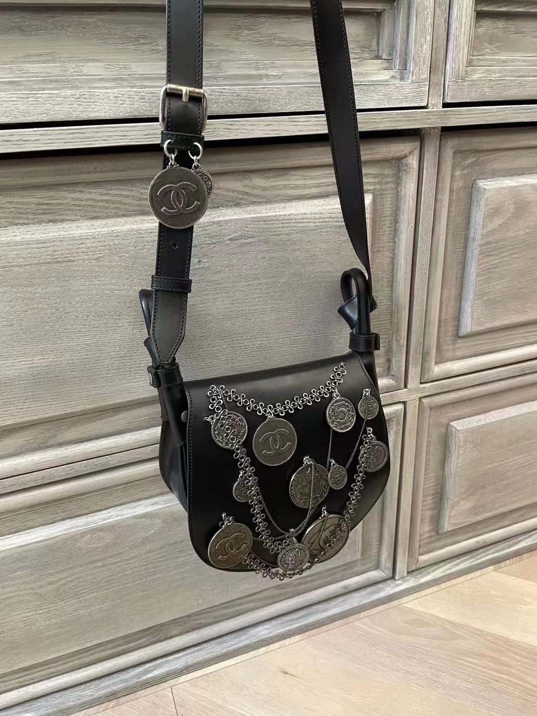 Chanel portrait coin saddle bag
